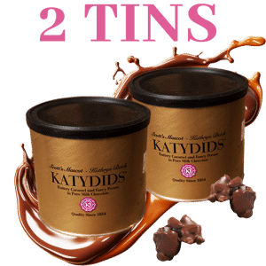 Two tins of Katydids chocolate-covered caramel and pecan clusters, a premium fundraising product.